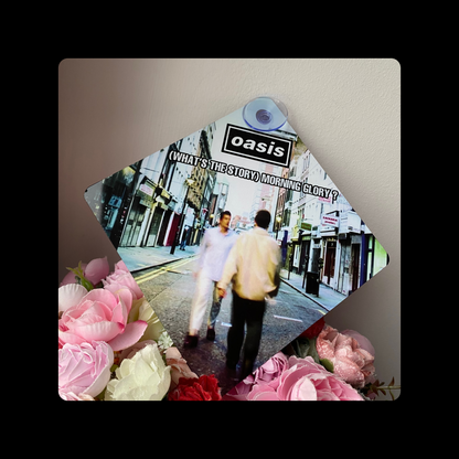 Oasis (What’s The Story?) Morning Glory Metal Window Sign 14cm x 14cm (Includes Suction Hook)